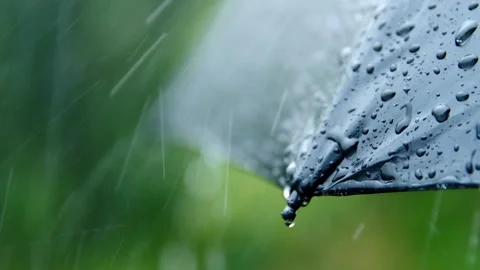 Rain Drops on blue Umbrella , Slow Motion Filmed on Cinematic Camera hd 4K Stock-Footage 336572593