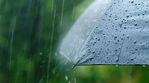 Rain Drops on blue Umbrella , Slow Motion Filmed on Cinematic Camera hd 4K Video stock 336572672
