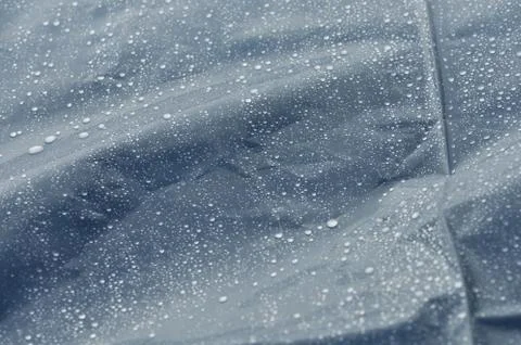 Rain drops on bumpy surface Stockfoto's