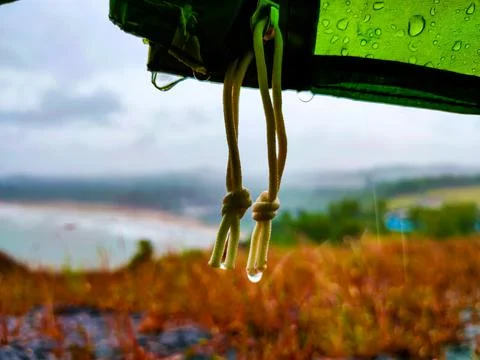 Rain drops from camping ten with mountain veiw 스톡 사진