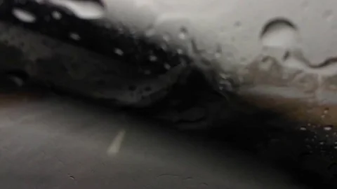 Rain drops on the car glass Stock Footage 71667606