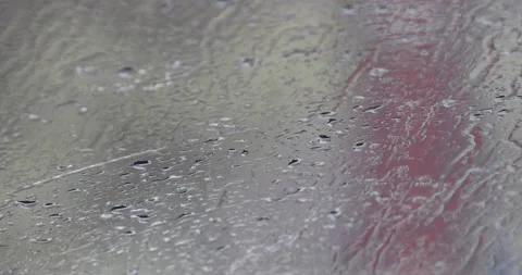 Rain Drops on car glass Stock Footage 335533793