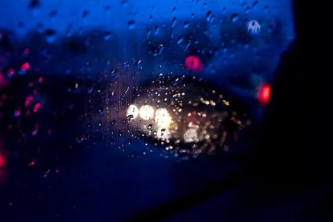 Rain Drops on car Side Window &amp; Side Mirror Stockfoto's