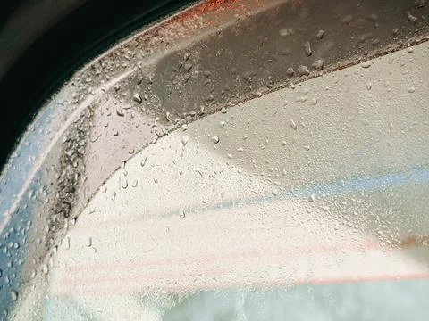 Rain Drops on Car Window Close-Up with Wet Glass Texture Stock Photos