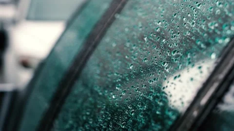Rain drops on car window Stock Footage 130870529