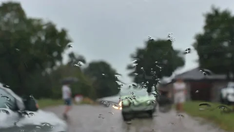 Rain drops on car window Stock Footage 203942726