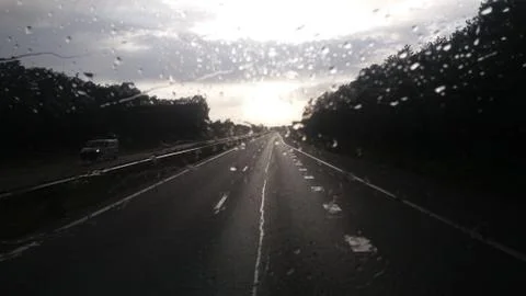 Rain drops on car window Stock Photos