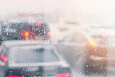 Rain drops on car window Stock Photos
