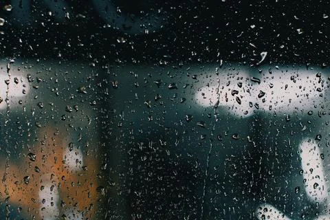  Rain drops on car windscreen with blurred background Stock Photos