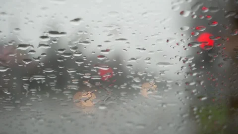 Rain drops on car windshield. Blurred focus. Stock Footage 121580628