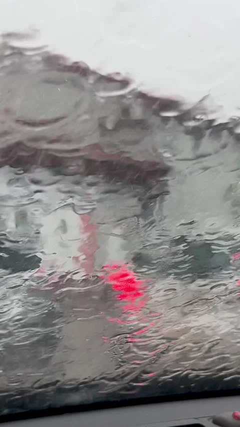 Rain Drops On Car Windshield With Blurred City Traffic Lights Stock Footage 340903968
