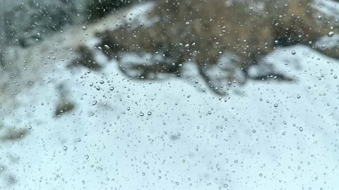 Rain drops on car windshield, water drop, raindrops on the windshield car Stock Footage 229900623