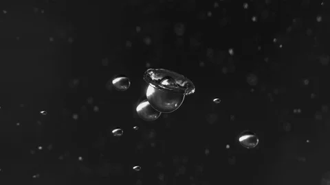 Rain drops of clear water colliding in slow motion Stock Footage 95298026