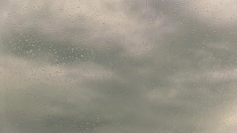 Rain drops on clear window Stock Footage 135443394