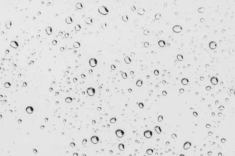 Rain drops on clear window Stock Photos