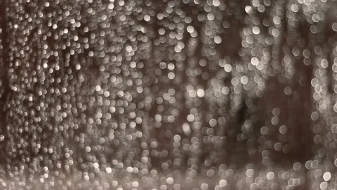 Rain drops defocused running down the window glass, colorless abstract backgroun 動画素材 86546812