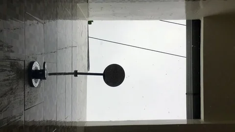 Rain drops falling into the camera in an open-roof bathroom in Bali, Indonesia Stock Footage 80105275