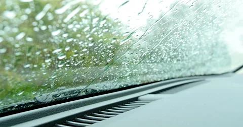 Rain drops falling on car window 動画素材 51948489