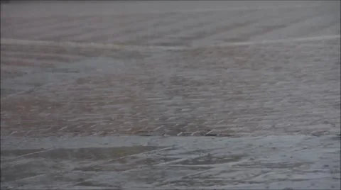 Rain drops falling to cobbles Stock Footage 48503443