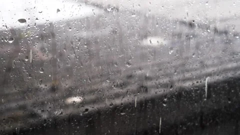 Rain Drops Falling down on apartment roof, dirty window glass Stock Footage 294941009