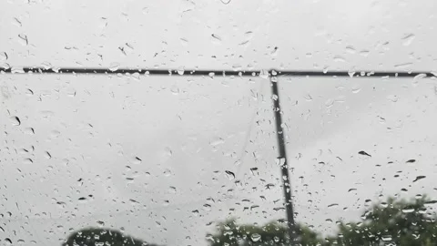 Rain Drops Falling down on background view, High quality footage of Rain on Wind Stock Footage 202121528
