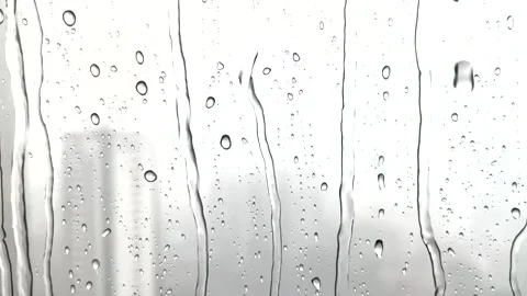 Rain Drops Falling down on Window, HD quality footage of Rain on Window Sky D Stock Footage 171231362