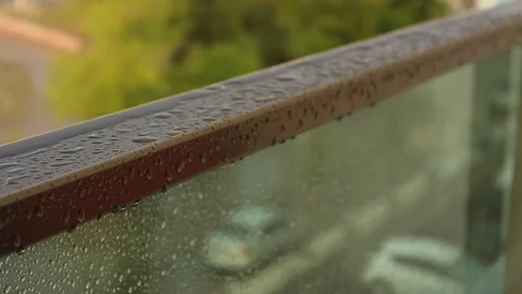 Rain drops falling on the glass HD 1080 Stock Footage 126085304