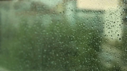 Rain drops falling on the glass HD 1080 Stock Footage 126085388