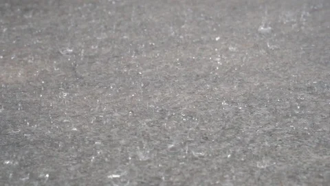 Rain drops falling into the ground slow motion Stock Footage 90613664