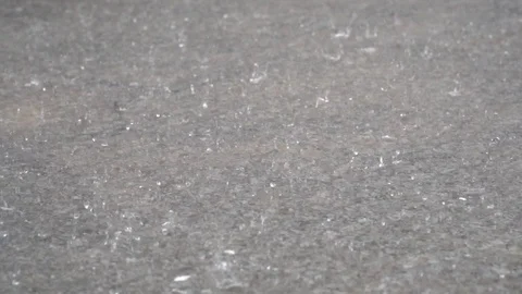 Rain drops falling into the ground slow motion Stock Footage 90613758