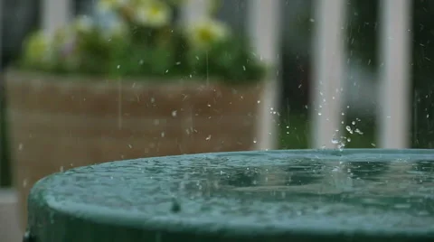 Rain Drops Falling on Metal Table in Slow Motion Stock Footage 52977321