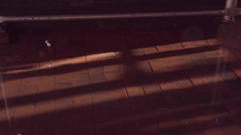 Rain drops falling in puddle on bricks Stock Footage 157114539