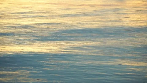 Rain drops falling in river ripple water at sunset. Vídeo Stock 245618142