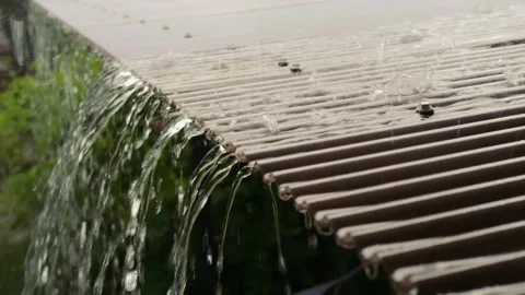 Rain Drops Falling on Roof, Water Dripping in a Tropical Storm, Rain season in Stock Footage 311249762