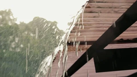 Rain Drops Falling on Roof, Water Dripping in a Tropical Storm, Rain season in Stock Footage 311249913