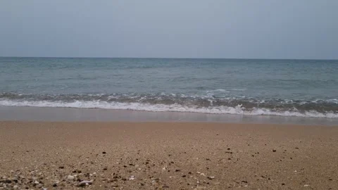 Rain Drops Falling on Sandy Shore, Peaceful Coastline 4K Stock Footage 318740891