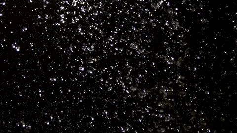 Rain drops falling in super slow motion on black background Stock Footage 146368225