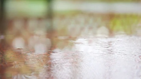 Rain drops falling on surface Video stock 76099707