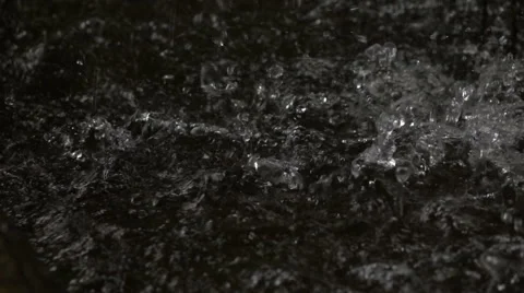 Rain Drops Falling On Water Surface Stock Footage 55186943