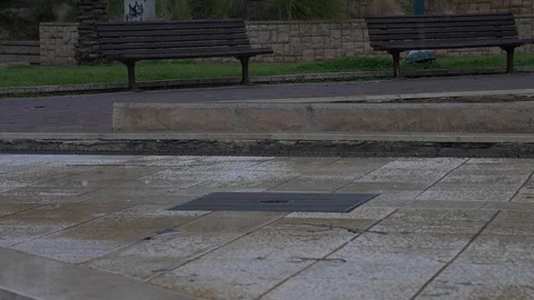 Rain drops on the floor in slow motion Stock Footage 86625462