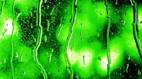 Rain Drops Flowing Down a Window Stock Footage 49482097