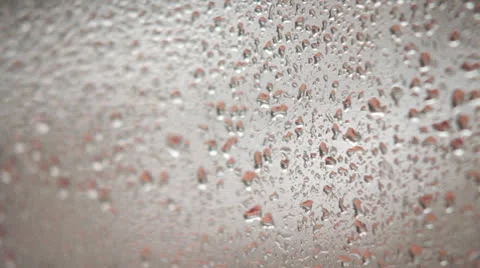 Rain drops flows down on window Видео 23724791