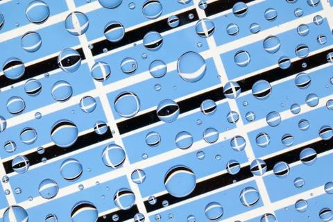 Rain drops full of Botswana flags Stock Illustration