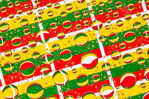 Rain drops full of Lithuania flags Stock Photos
