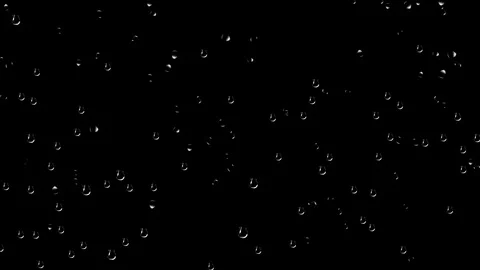 Rain drops on glass with dark background Stock Footage 123992937