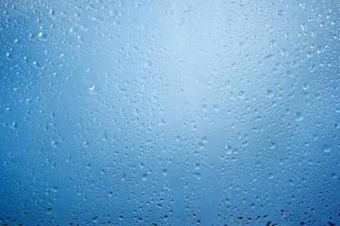 Rain: drops on a glass Stock Photos