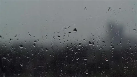 Rain drops on glass surface. Abstract wet droplets on transparent window glass Stock Footage 251735752