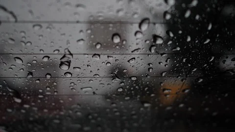 Rain drops on glass window in the dark night Stock Footage 113895401