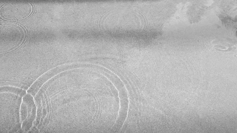 Rain drops on grey water pool pond step Stock Footage 135690227