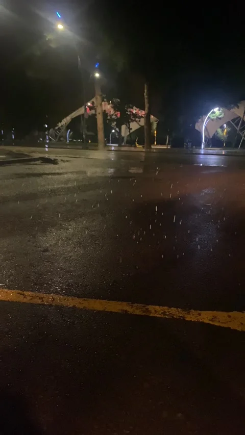 Rain Drops in Headlights at Night – Vertical 4K Stock Footage 347747215